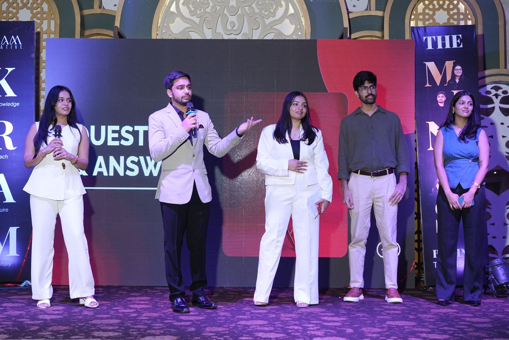 The KRAM Creative team taking questions on stage during the launch Q and A